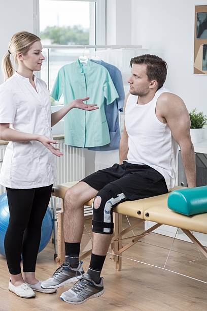 istock Physiotherapist discussing medical treatment 509252528