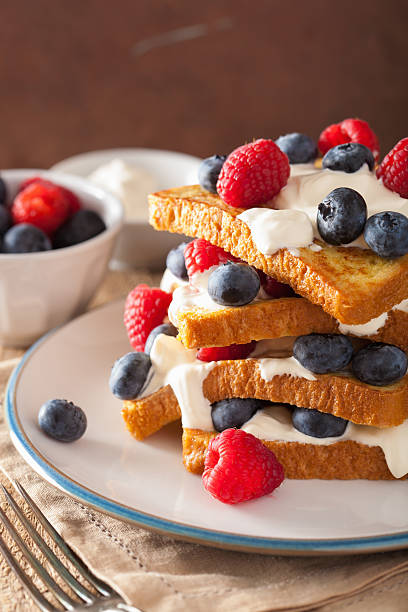 istock french toasts with creme fraiche and berries for breakfast 509253488