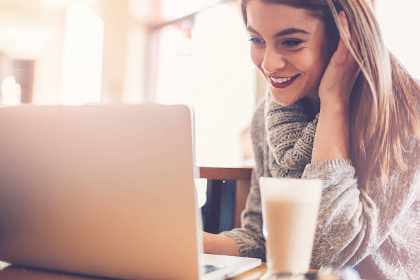 istock Woman at coffee shop checkin e-mail 509253830