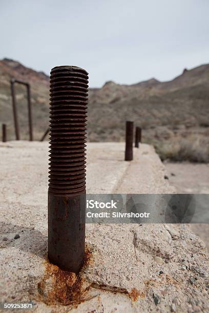 Close Up Of Rusty Bolt In A Concrete Foundation Stock Photo - Download Image Now - Bolt - Fastener, Clipping Path, Construction Site