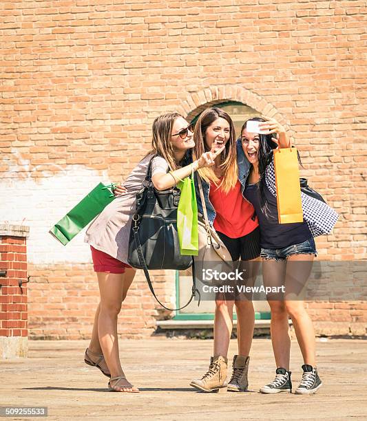 Group Of Happy Best Friends With Shopping Bags Taking Selfie Stock Photo - Download Image Now