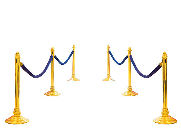 istock golden pole barricade isolated on white 509257121