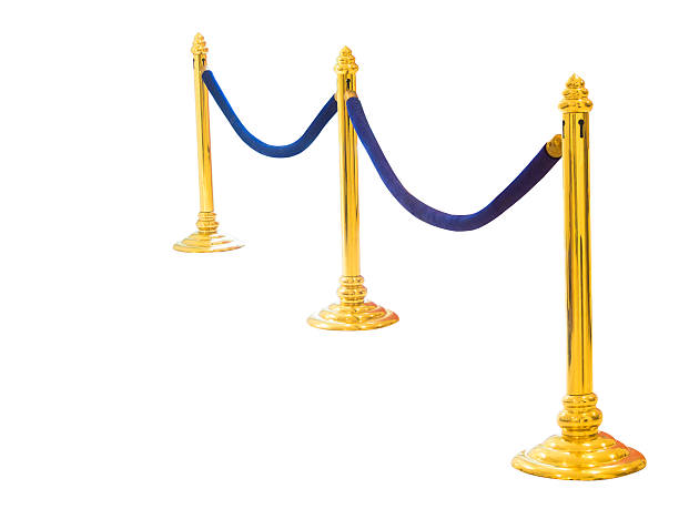istock golden pole barricade isolated on white 509257123