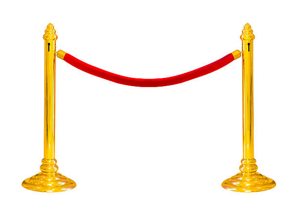 istock golden pole barricade isolated on white 509257125
