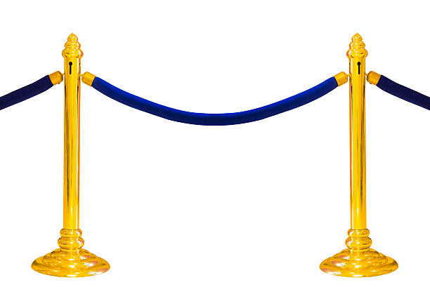 istock golden pole barricade isolated on white 509257129