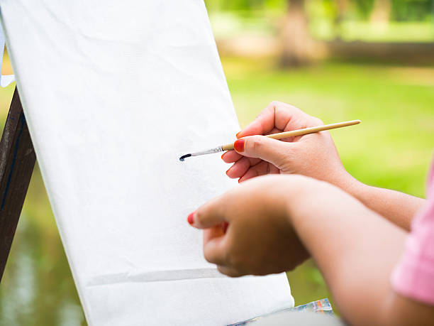 istock painting some picture with paintbrush 509257139