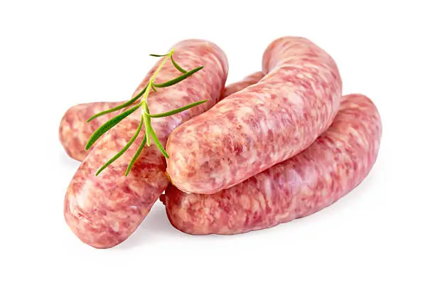 Pork sausages with rosemary isolated on white background