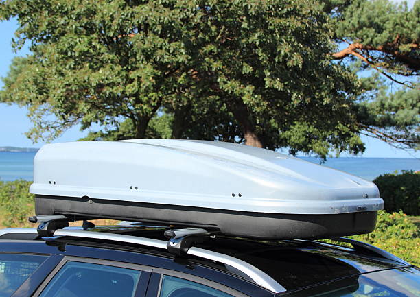 istock Roof box on car with railing 509278829