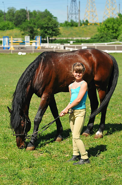 istock Girl with horse 509279461