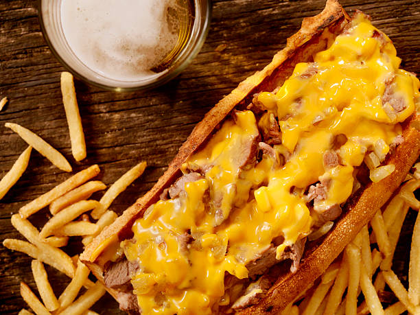 istock Philly Cheese Steak Sandwich with Fries and a Beer 509287696