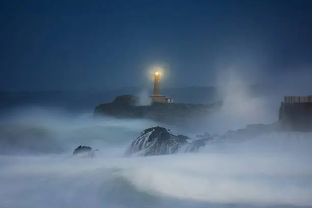 Photo of Mouro lighthouse in Santander at night