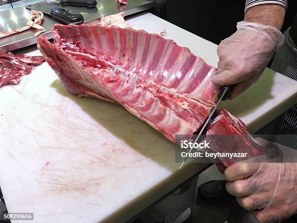 Cutting Lamb Meat Stock Photo - Download Image Now - Meat, Meat Cleaver, Beef