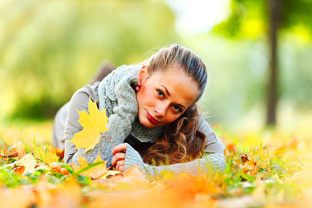 istock woman portret in autumn leaf 509290951