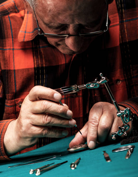 istock Repairing old pocket watch 509291607