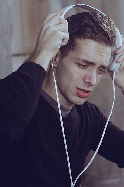 istock attractive guy with headphones in the city 509294092