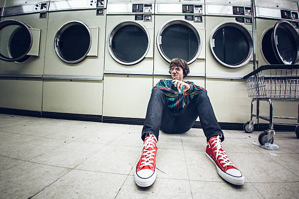 White clothes in an industrial washing machine at the dry cleaners