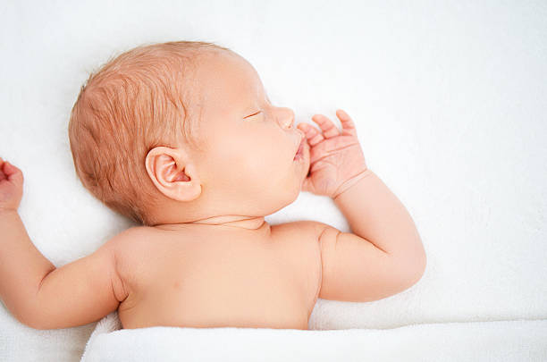istock Cute newborn baby sleeps 509295582