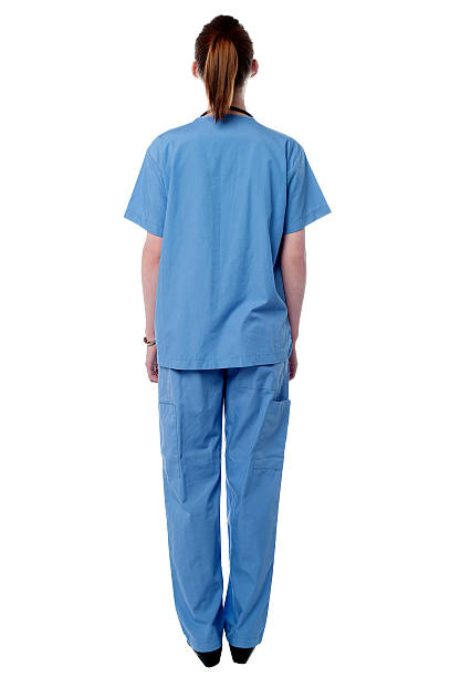 Rear view of doctor standing stock photo