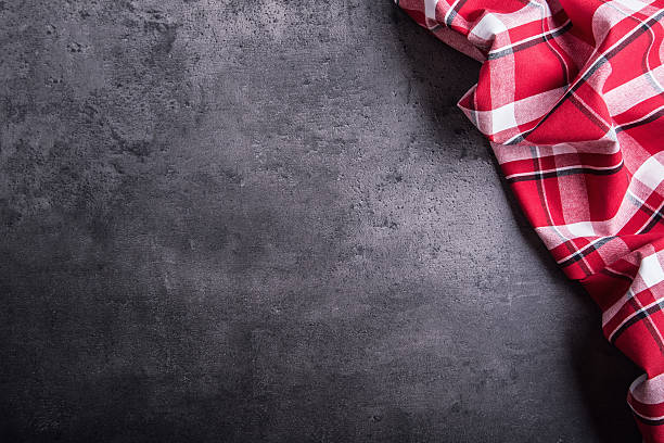 istock Top view of checkered kitchen tablecloth on table 509296390