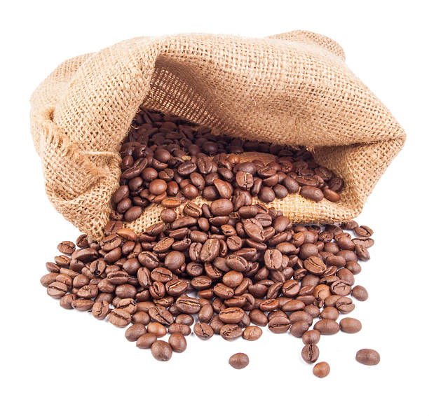 istock Coffee beans in bag isolated on white background 509296455