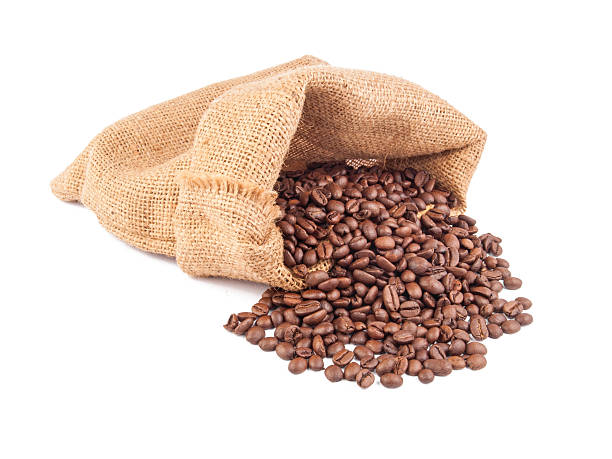 istock Coffee beans in bag isolated on white background 509296485