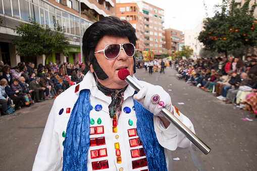 Badajoz, Spain - February 7, 2016: Elvis performers takes part in the Carnival parade of troupes at Badajoz City, on February 7, 2016. This is one of the best carnivals in Spain, especially highlighting massive participation of people
