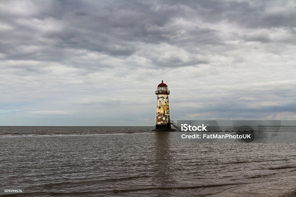 Point of Ayr Lighthouse. Point of Ayr derelict lighthouse, on the most northern tip of Wales. Talacre, Flintshire, United Kingdom. Abandoned Stock Photo