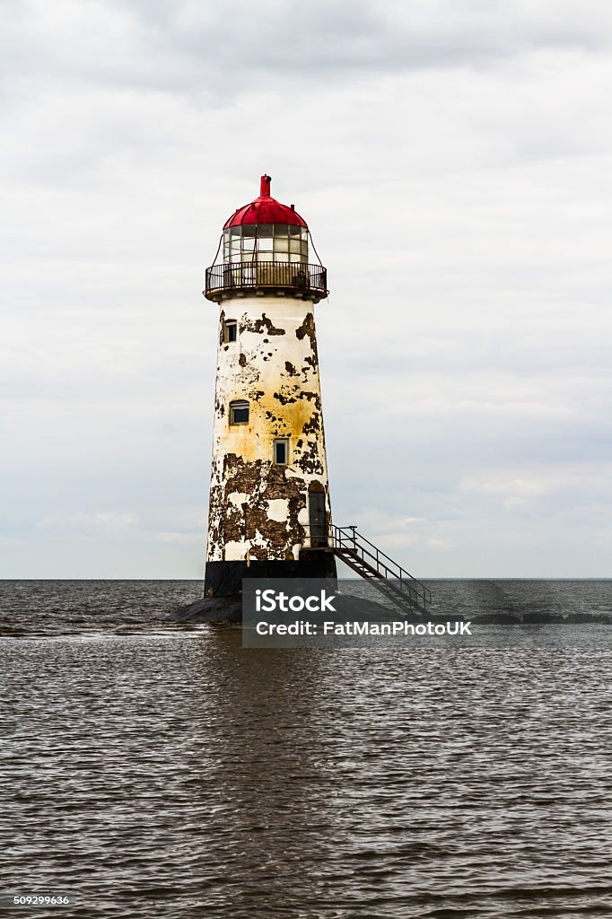 Point of Ayr Lighthouse. Point of Ayr derelict lighthouse, on the most northern tip of Wales. Talacre, Flintshire, United Kingdom. Abandoned Stock Photo