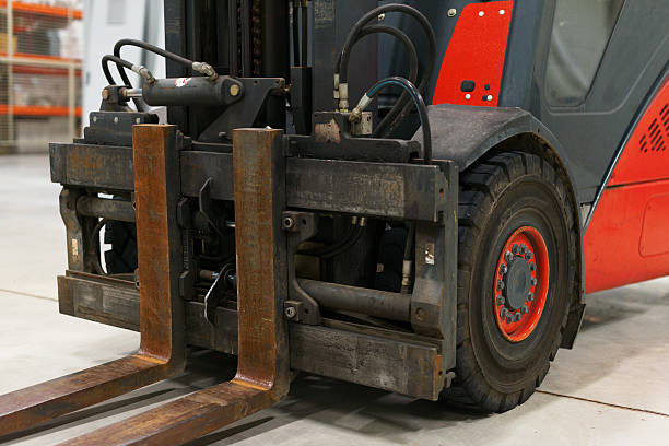 istock Close-up view of forklift loader forks. 509300052