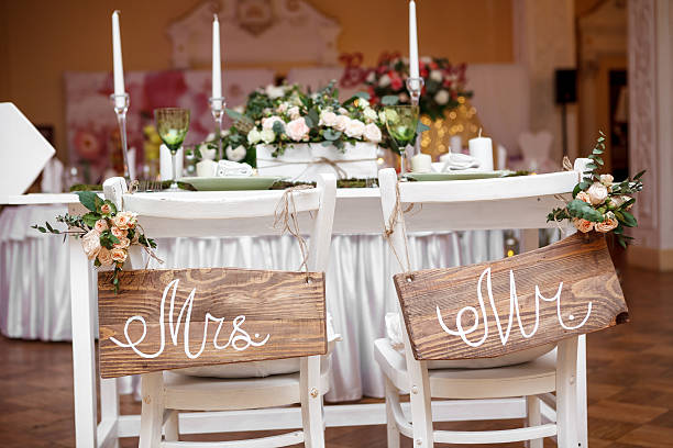 Mr. & Mrs. Sign Mr. & Mrs. Sign on the chair honeymoon photos stock pictures, royalty-free photos & images