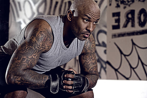 Middle aged black man at an urban styled boxing gym