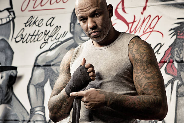 istock Middle aged black man at an urban styled boxing gym 509305642
