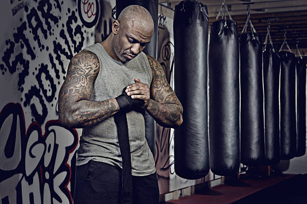 istock Middle aged black man at an urban styled boxing gym 509305646