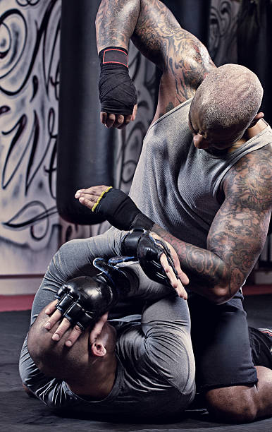 istock Two fighters sparring at an urban boxing gym 509305930