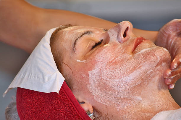 Face massage Face massage creaming stock pictures, royalty-free photos & images