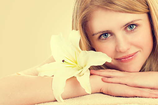 Portrait of a beautiful young smiling woman