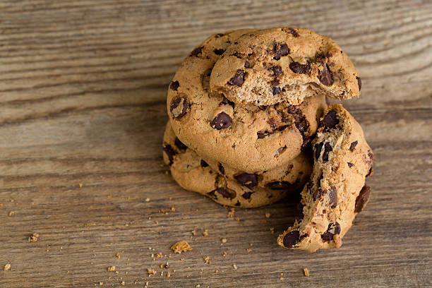 istock Brown cookies on wooden background 509307390