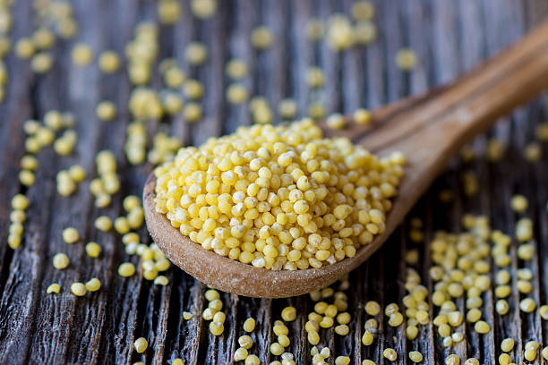 istock Millet on wooden spoon 509307966