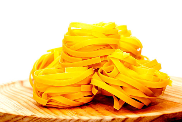 Italian noodle nest on wooden