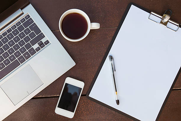 istock Office supplies on the wooden table 509311960