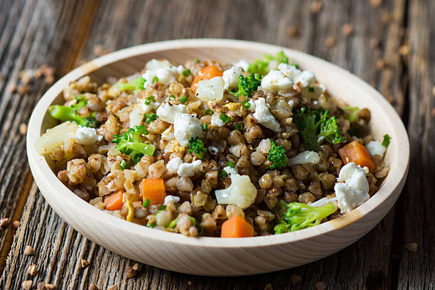 istock Buckwheat with  vegetables and feta cheese 509313434