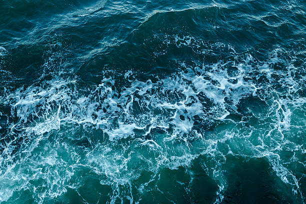 istock Blue sea texture with waves and foam 509314332