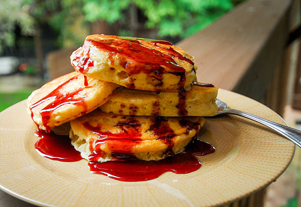 Delicious Plated Pancakes with Homemade Bing Cherry Syrup
