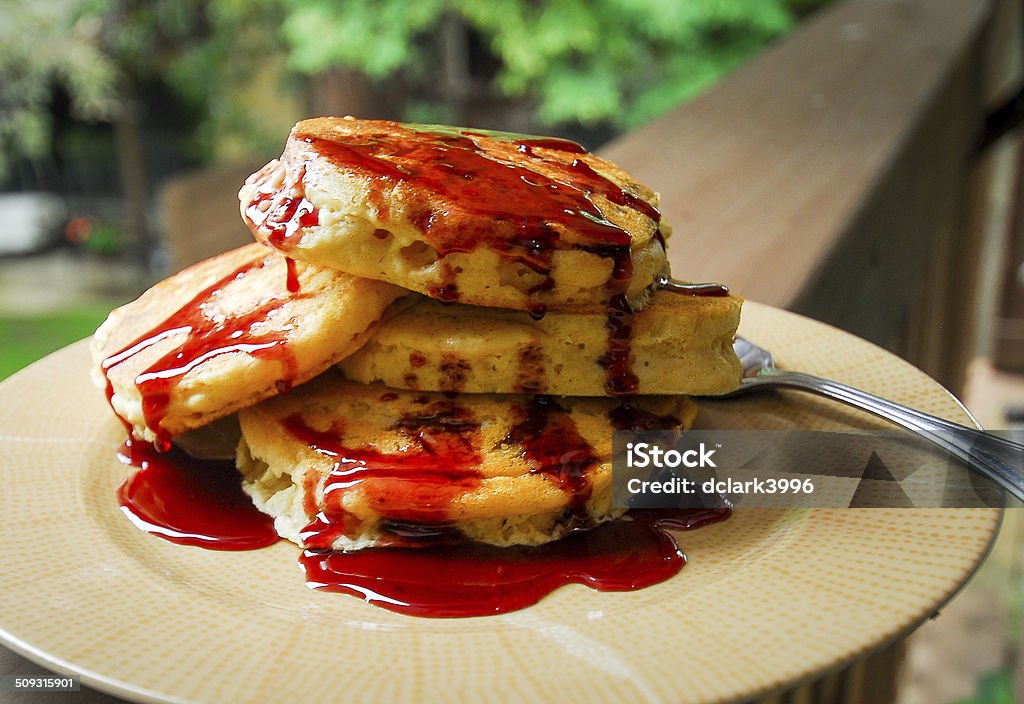 Delicious Plated Pancakes with Homemade Bing Cherry Syrup Plated pancakes with bing cherry syrup Breakfast Stock Photo