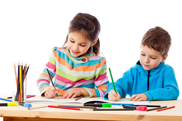 istock Two little kids draw with crayons together 509315904