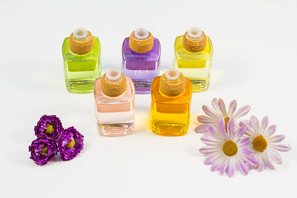 istock Scented oils and purple flowers 509316243