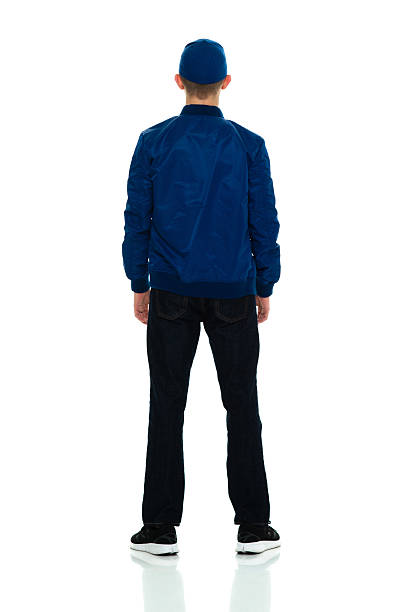 istock Rear view of casual man looking away 509316462