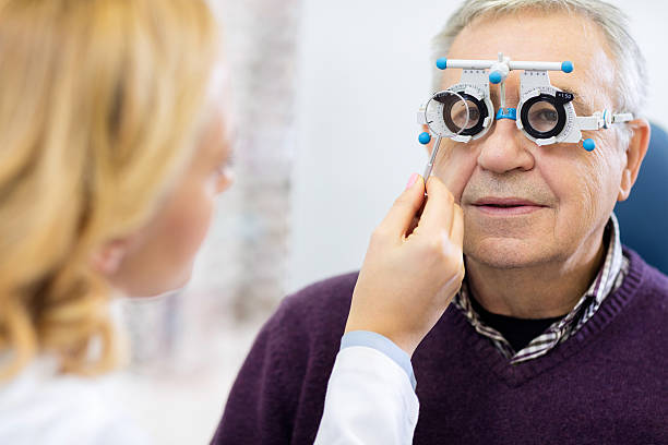istock Optical specialists precisely determines diopter to senior patie 509316592