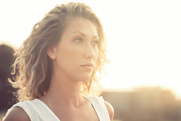 istock beautiful woman and sunbeams 509316872