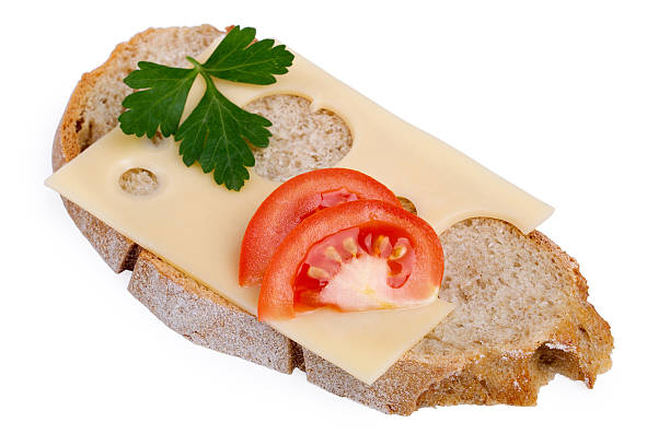 istock Rye bread, cheese and tomato isolated on a white background 509316936